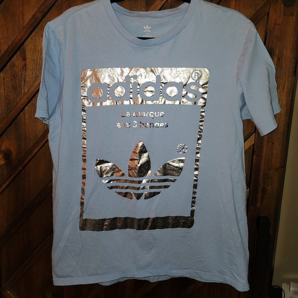 Adidas blue and silver shirt